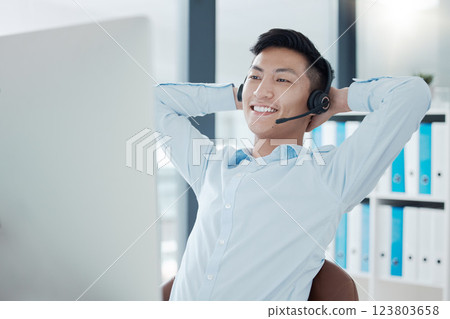 Call center, computer or relax man in success sales deal, customer support crm or consulting help in Vietnamese b2b office. Happy smile, telemarketing or contact us technology receptionist stretching Call center, computer or relax man in success sales deal, customer support crm or consulting help in Vietnamese b2b office. Happy smile, telemarketing or contact us technology receptionist stretching 123803658