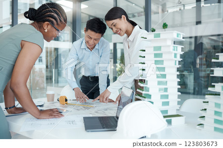 Team, architect and talking about construction in office for building, planning and new strategy collaboration.Blueprint, teamwork and engineer group brainstorming plans, in workplace and workspace. 123803673
