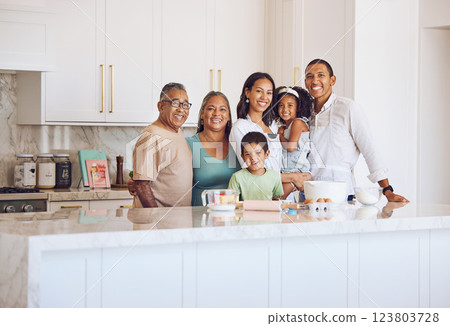 Cooking, family and portrait with grandparents in kitchen enjoying leisure together at Cancun home. Senior and young Mexican parents excited to teach small children baking skill for bonding activity. Cooking, family and portrait with grandparents in kitchen enjoying leisure together at Cancun home. Senior and young Mexican parents excited to teach small children baking skill for bonding activity. 123803728