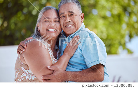 Love, senior couple and hug with smile, happy and bonding to celebrate, relationship, marriage and being romantic together. Portrait, mature man and woman hold each other, being loving or for romance Love, senior couple and hug with smile, happy and bonding to celebrate, relationship, marriage and being romantic together. Portrait, mature man and woman hold each other, being loving or for romance 123803893