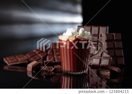 Hot chocolate with mini marshmallow in a glass mug. 123804215