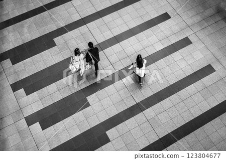 A bird's-eye view of people walking inside Osaka Umeda Station 123804677