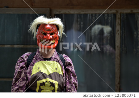 Shiro Shrine's Autumn Festival: Stick wielders dressed in demon costumes Shiro Shrine's Autumn Festival: Stick wielders dressed in demon costumes 123806371