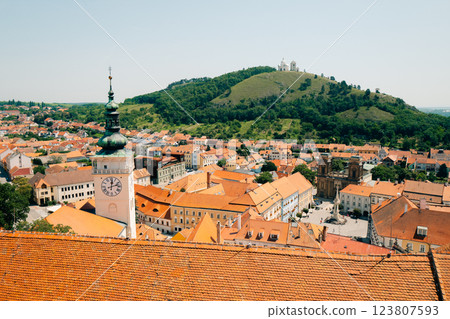 View of the tower and the holy hill in the town of Mikulov na Moravian View of the tower and the holy hill in the town of Mikulov na Moravian 123807593