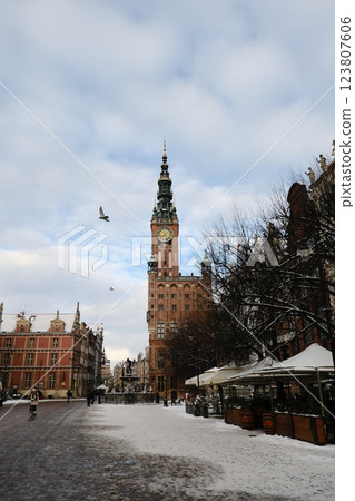 The Historic Clock Tower is surrounded by charming architecture of the city The Historic Clock Tower is surrounded by charming architecture of the city 123807606
