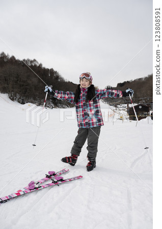 Ski slope and girl Ski slope and girl 123808591