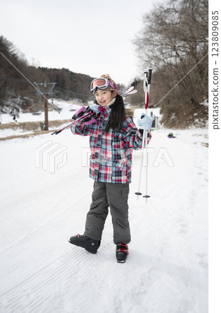 Ski slope and girl Ski slope and girl 123809085