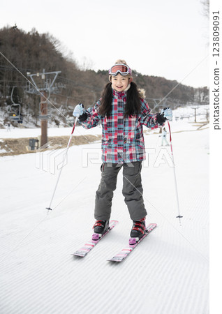 Ski slope and girl 123809091