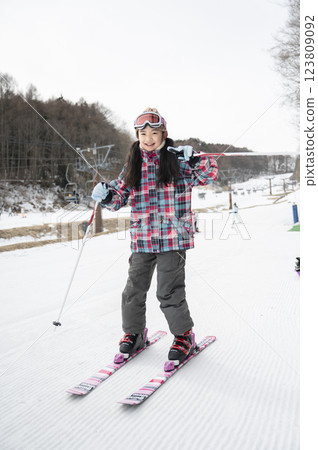 Ski slope and girl Ski slope and girl 123809092