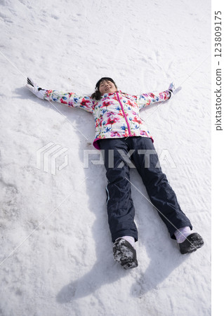 Ski slope and girl Ski slope and girl 123809175