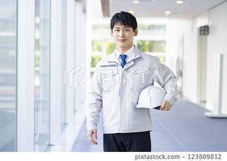 Portrait of a man wearing business work clothes 123809812