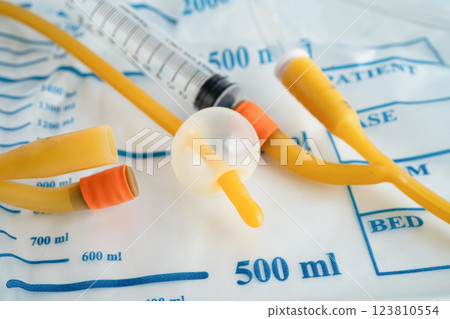 Foley catheter and urine drainage bag collect urine for disability or patient in hospital. Foley catheter and urine drainage bag collect urine for disability or patient in hospital. 123810554
