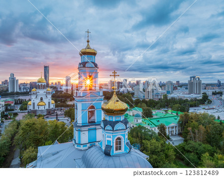 Summer Yekaterinburg, Temple of the Ascension and Temple on Blood in beautiful clear sunset. Summer Yekaterinburg, Temple of the Ascension and Temple on Blood in beautiful clear sunset. 123812489