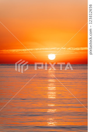 Beautiful red and orange sunrise over the sea. 123812656