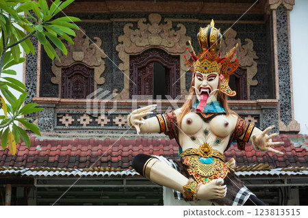 Traditional demon ogoh-ogoh at ritual parade of terrible monsters - Ngrupuk, which is held in evening of Nyepi - Balinese New Year before silence day. Arts and culture of Bali island people. Traditional demon ogoh-ogoh at ritual parade of terrible monsters - Ngrupuk, which is held in evening of Nyepi - Balinese New Year before silence day. Arts and culture of Bali island people. 123813515
