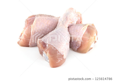 Fresh raw chicken drumsticks isolated on white background Fresh raw chicken drumsticks isolated on white background 123814786