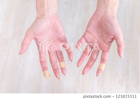 Hands rough from housework Hands rough from housework 123815311
