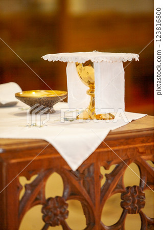 An Elegant Communion Set beautifully displayed on a lovely Altar with a Linen Tablecloth An Elegant Communion Set beautifully displayed on a lovely Altar with a Linen Tablecloth 123816800