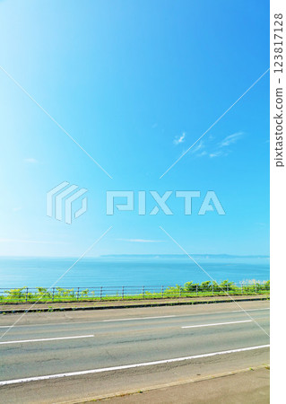 Hokkaido blue sky and seaside road Hokkaido blue sky and seaside road 123817128