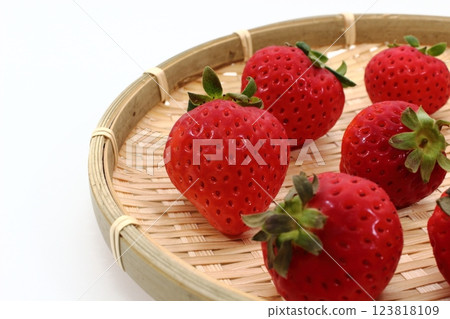 A single red strawberry to brighten up your dinner table 123818109