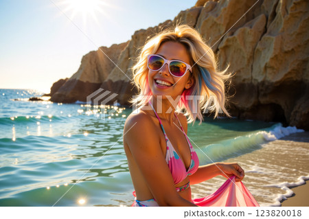 Joyful woman at the beach. 123820018