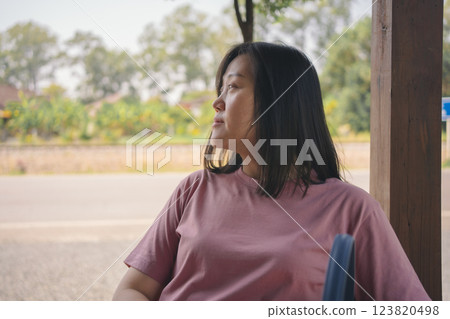 happy and cheerful with asian woman enjoy with coffee and cake in coffee shop happy and cheerful with asian woman enjoy with coffee and cake in coffee shop 123820498