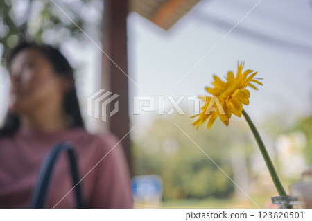 happy and cheerful with asian woman enjoy with coffee and cake in coffee shop 123820501