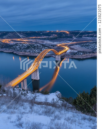Bridge Over Water at Dusk. 123821075