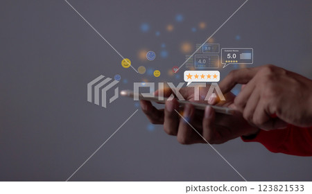 Young Man hand touching emoji and five star to review and give 5 stars  123821533