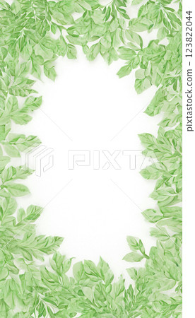 Spring frame made of delicately green leaves. Soft matte pastel color. Earth Day, ecology Spring frame made of delicately green leaves. Soft matte pastel color. Earth Day, ecology 123822044