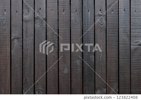 A detailed image of dark wooden planks with visible texture, 123822408