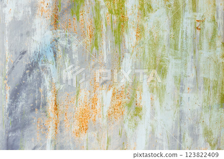 Old weathered wall with multi-colored peeling paint, background texture 123822409