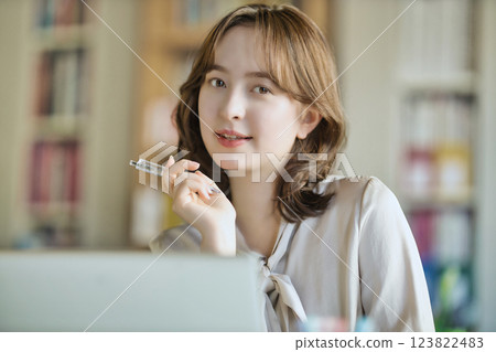 Young woman working in the office 123822483