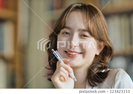 Young woman working in the office Young woman working in the office 123823153