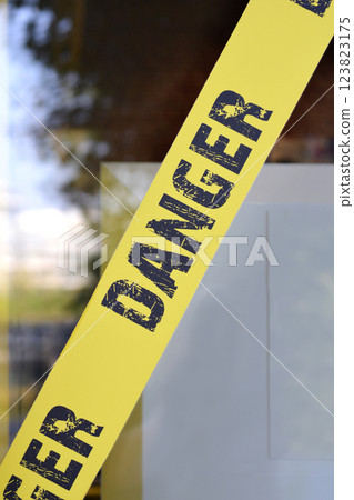 Yellow danger tape Yellow danger tape 123823175