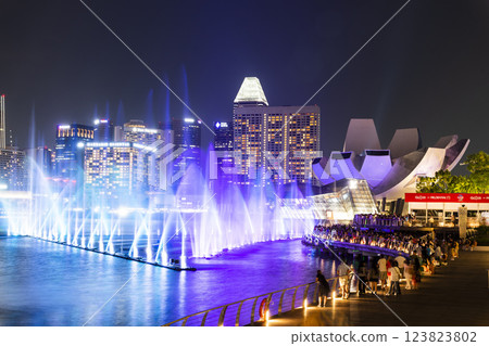 Beautiful view of the nightly music, water, and light show at Marina Bay Sands, here is an integrated resort fronting Marina Bay in Singapore. Beautiful view of the nightly music, water, and light show at Marina Bay Sands, here is an integrated resort fronting Marina Bay in Singapore. 123823802