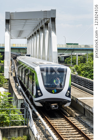 A Green Line train running on the elevated track of the Taichung Rapid Transit System in Taiwan. A Green Line train running on the elevated track of the Taichung Rapid Transit System in Taiwan. 123824316
