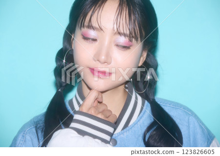 Casual portrait of a young woman in street fashion Casual portrait of a young woman in street fashion 123826605