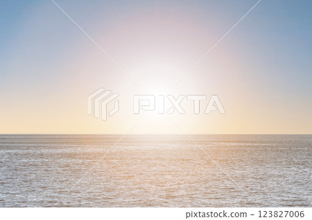 Beautiful sunrise on the ocean. Rays of sun over the sea. Dawn sky over the sea. Beautiful sunrise on the ocean. Rays of sun over the sea. Dawn sky over the sea. 123827006