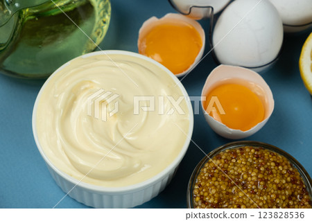 Classic traditional white mayonnaise in a bowl Classic traditional white mayonnaise in a bowl 123828536