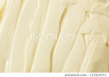 Abstract cooking background of smeared mayonnaise sauce, top view, creativity in cooking Abstract cooking background of smeared mayonnaise sauce, top view, creativity in cooking 123828551