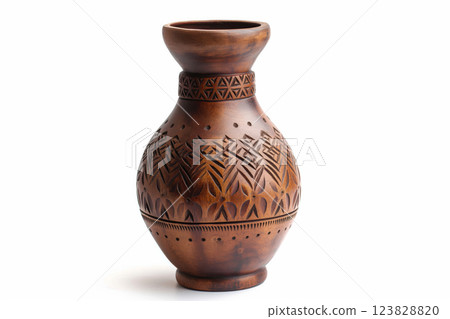 Elegant, handcrafted decorative vase with intricate tribal patterns, isolated on a pure white background, reflecting traditional artisan craftsmanship 123828820
