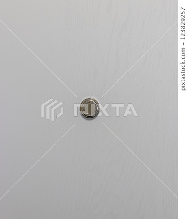 Close up shot of the door peephole Close up shot of the door peephole 123829257