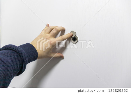 Close up shot of the door peephole 123829262