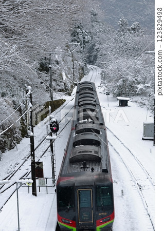 Snow-covered Oboke Station Express train Snow-covered Oboke Station Express train 123829498