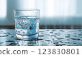 glass filled with water on table 123830801