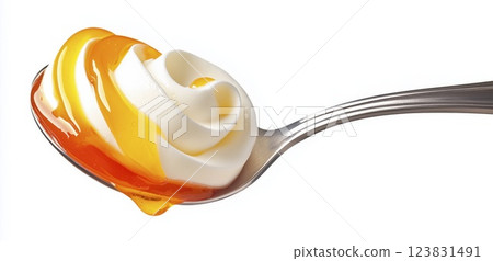 Yogurt and honey on spoon isolated on white background with clipping path 123831491
