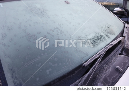 Frozen exterior windshield of a car Frozen exterior windshield of a car 123831542