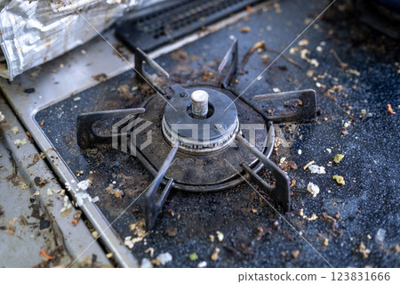 Retro gas stove dirty with food residue 123831666