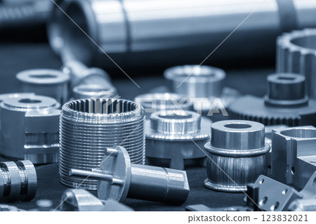 High precision parts manufacturing process in the light blue scene. High precision parts manufacturing process in the light blue scene. 123832021
